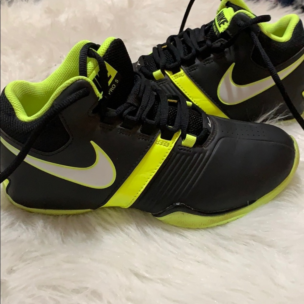 Lime green and black high top Nikes